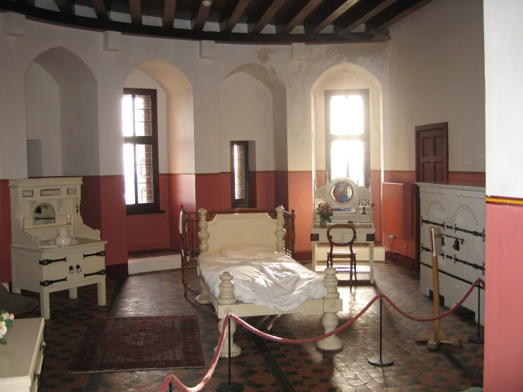 an old room with furniture and old fashioned furnishings