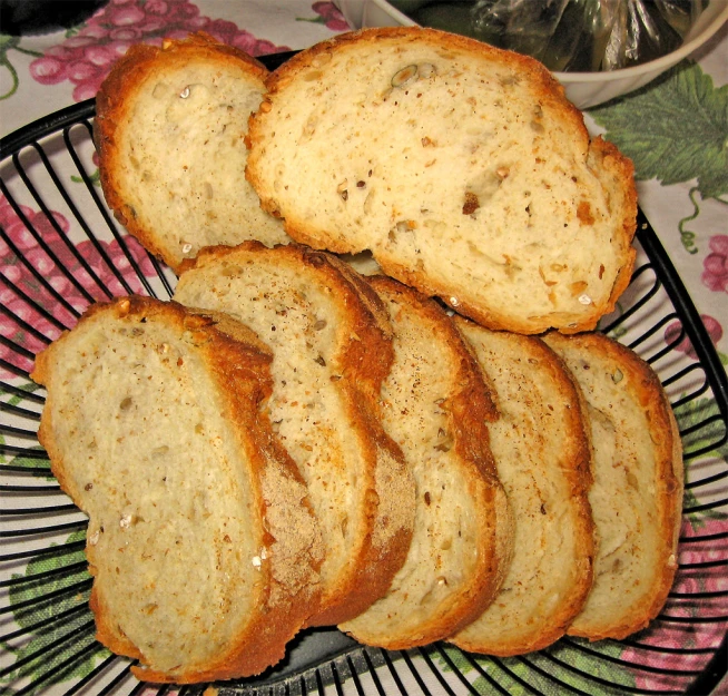 a bunch of loaves of bread on a plate