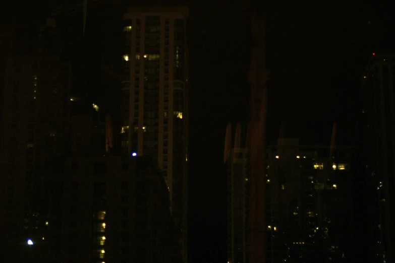 a nighttime view of a building with lots of lights on