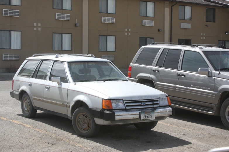 a couple of cars that are in the street