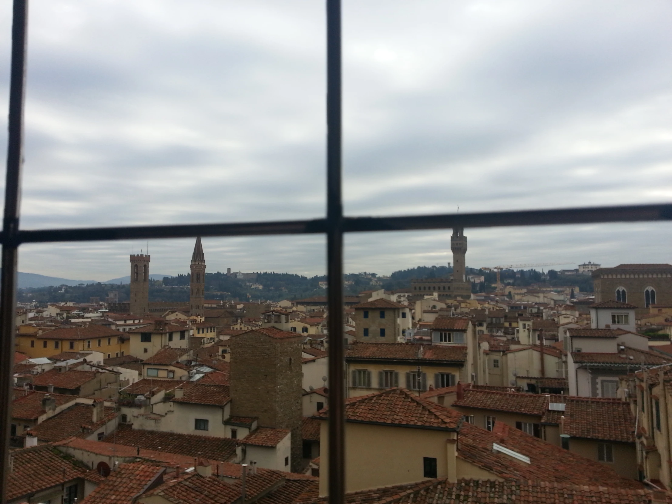 an image from the top of a building looking out over a town