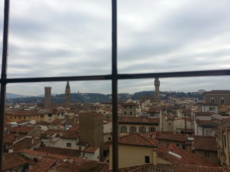 an image from the top of a building looking out over a town