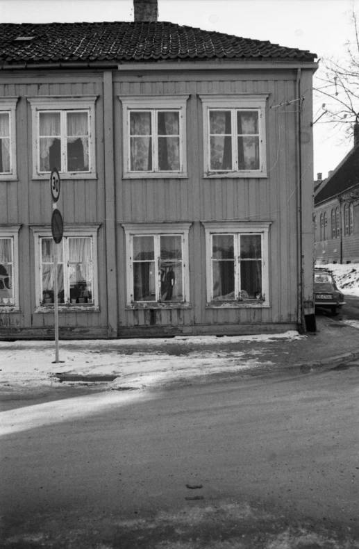 an old po of two large buildings with windows