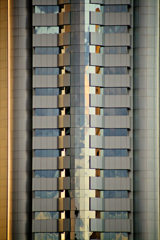 two building that are very tall with windows