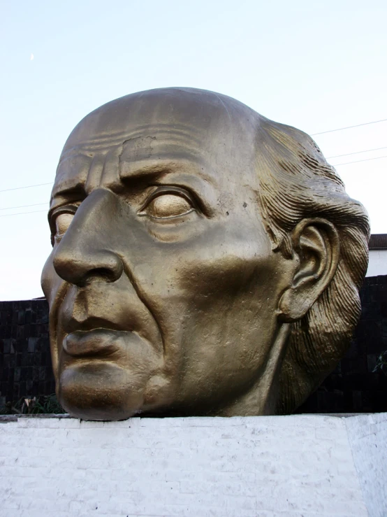 large golden bronze head of the president of the united states