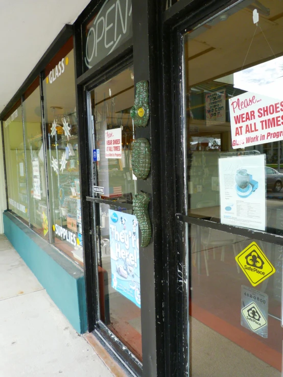 an empty store front with a sign on it