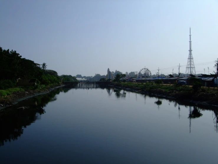 a long river flowing between two buildings near each other