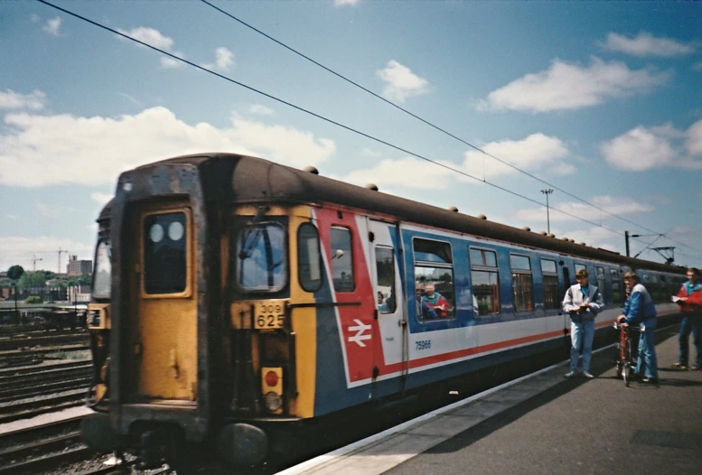 a train that is going down some tracks