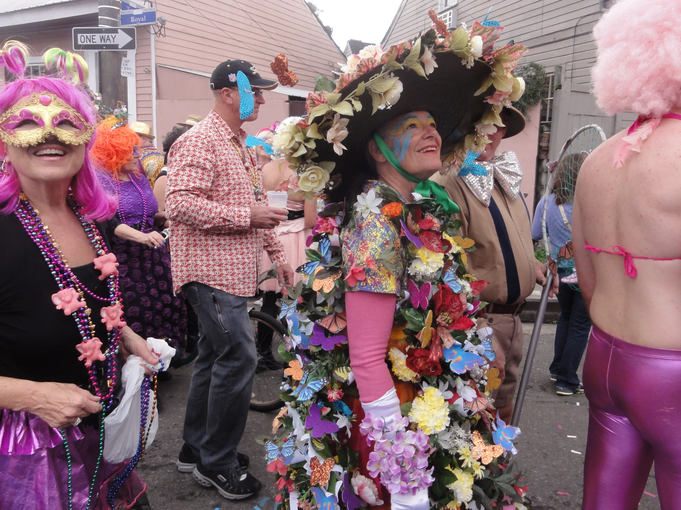 people are gathered together wearing a group costume