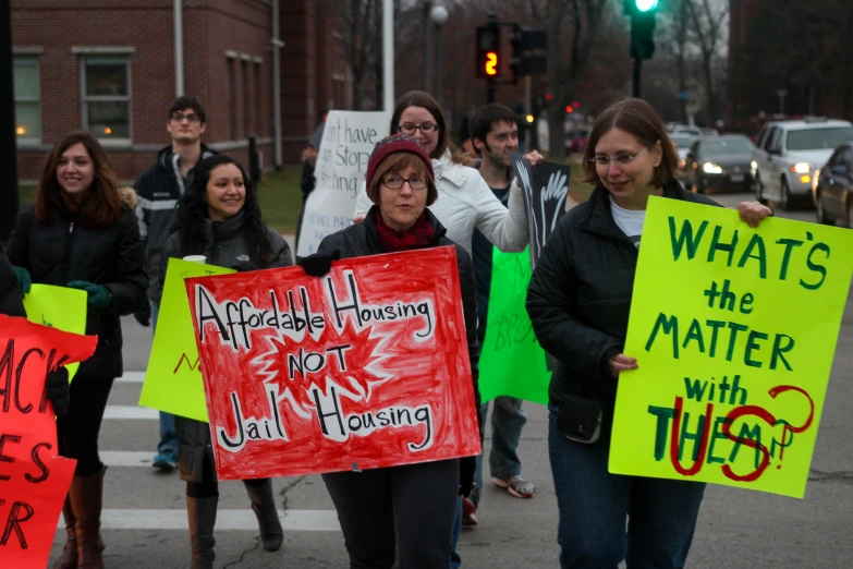 people walking in protest of the same person's death