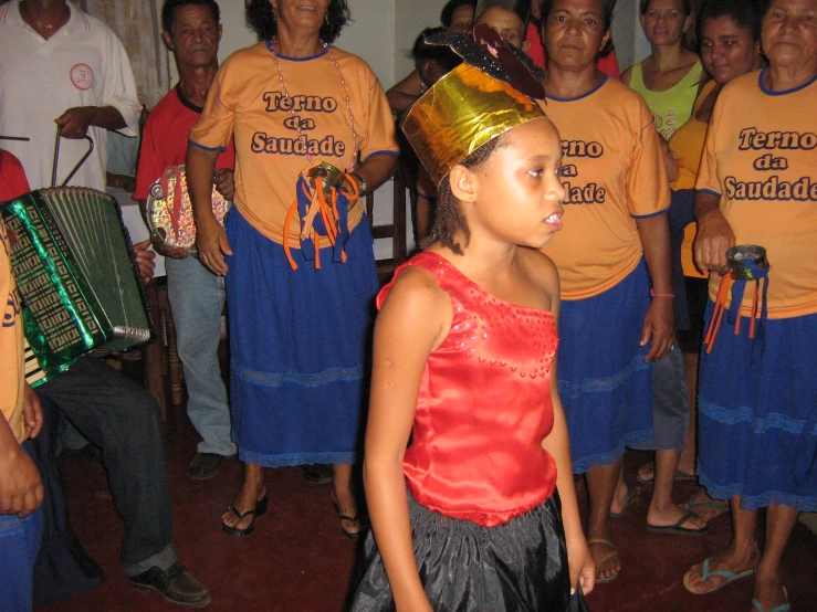 girls wearing t shirts with hats holding musical instruments