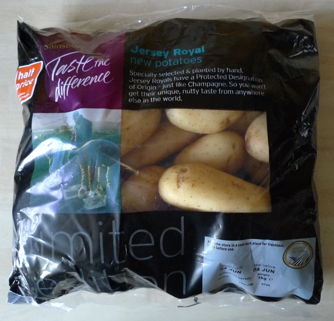 several potatoes and other types of fruit inside a plastic bag