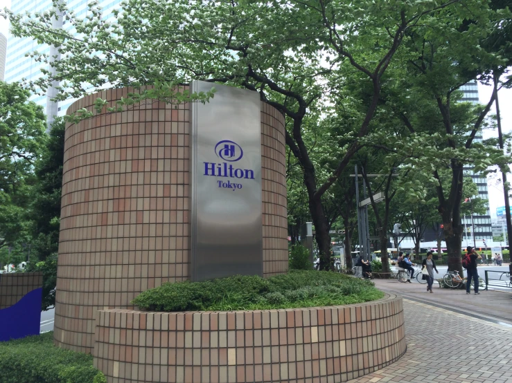 a sign for hilton international on the street