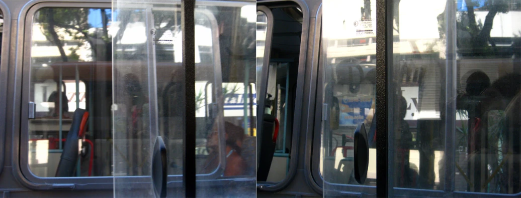 a group of windows on top of a subway car