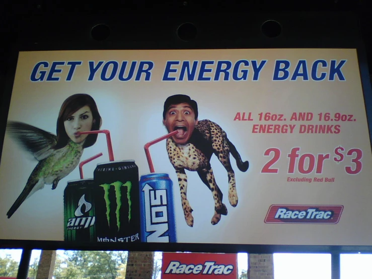 a large advertit with a man and woman in front of energy drinks