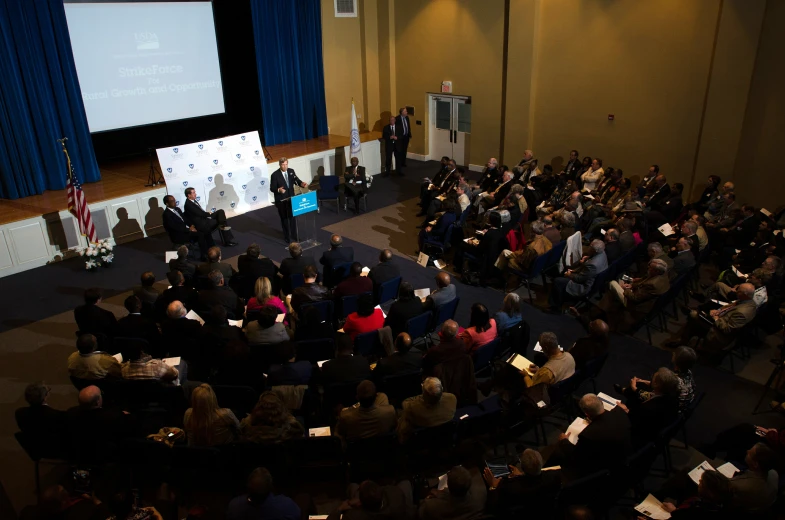 a view from above, there are several people that are at a public event