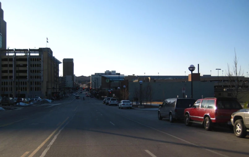 a group of cars parked along the side of a road