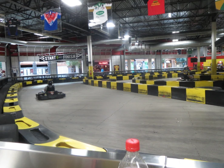 the indoor kart racing zone with the lanes empty