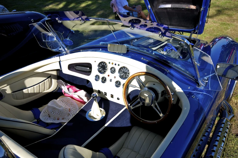 a car interior with leather seats and a steering wheel