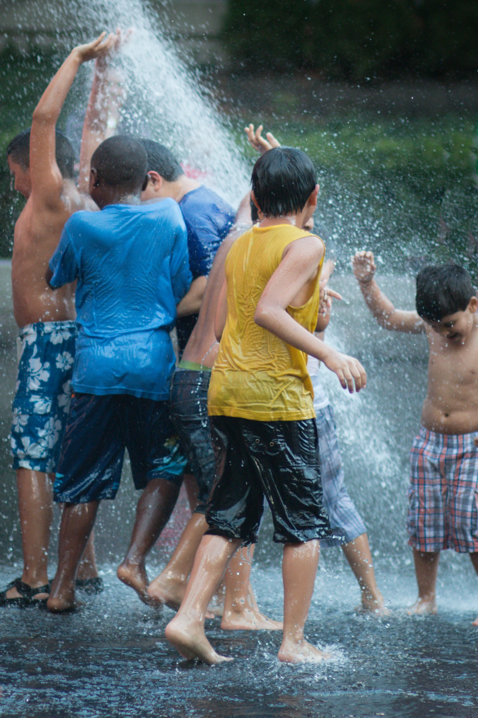 s enjoying splashing and playing in the water