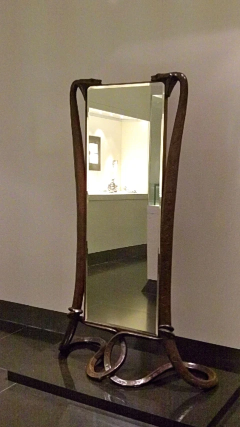 a mirror is in the middle of a room