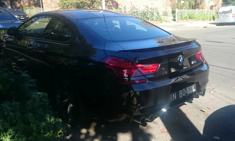 a car parked in the street on the side