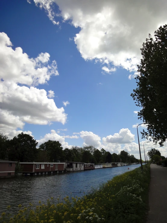 a view of houses next to the water near a road