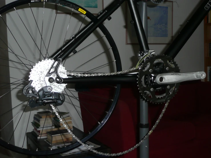 the front wheel of a bicycle sitting on display