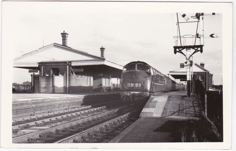 an old po of the outside of a train station