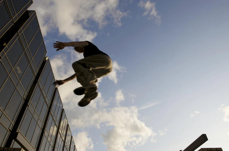 a man who is jumping high into the air