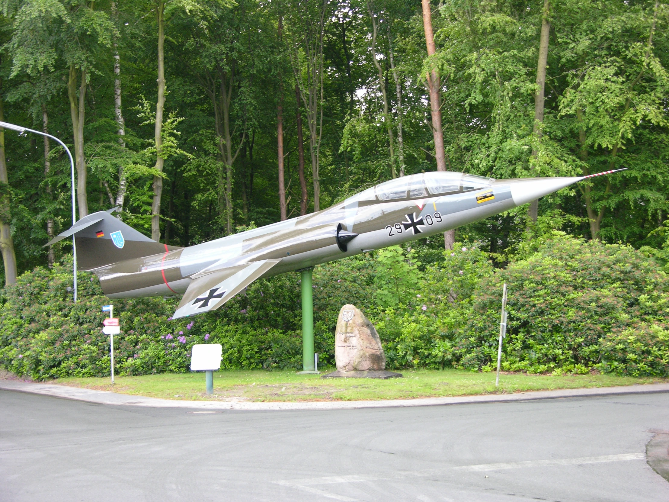 a plane that is flying upside down in the air