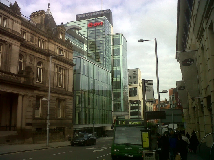 an image of some buildings and cars on a city street