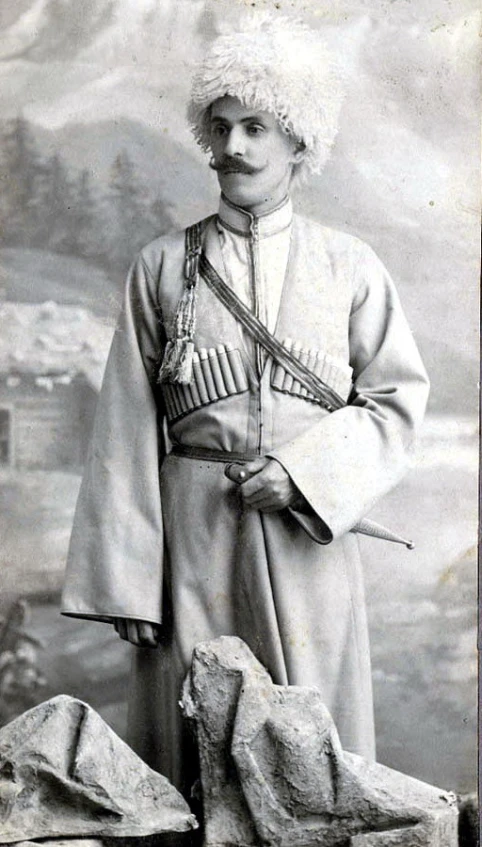 a historical po of a man in uniform with a rifle