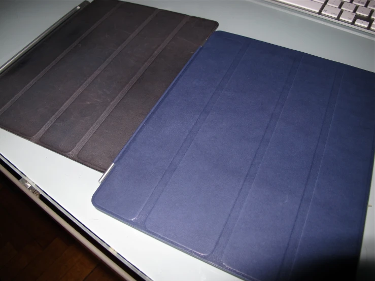 two covers on a laptop sit side by side