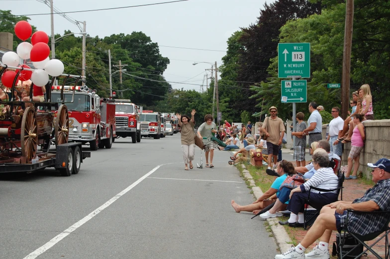 the parade has a fire truck in it