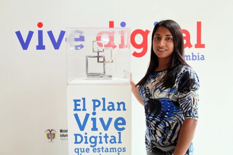 a woman showing off her digital vending machine