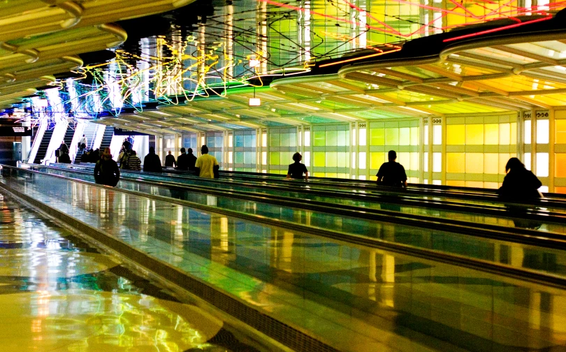 people sitting on their benches in the airport