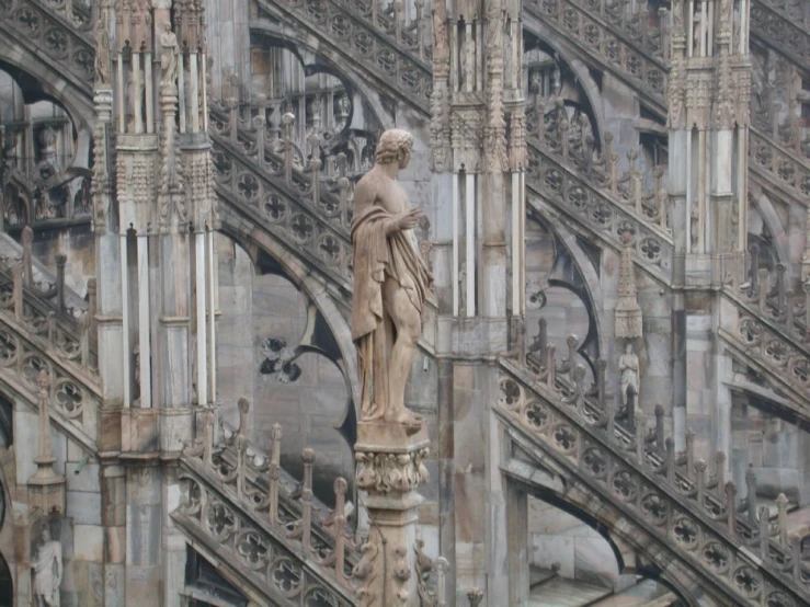 the building has several steeple sculptures and a clock on it