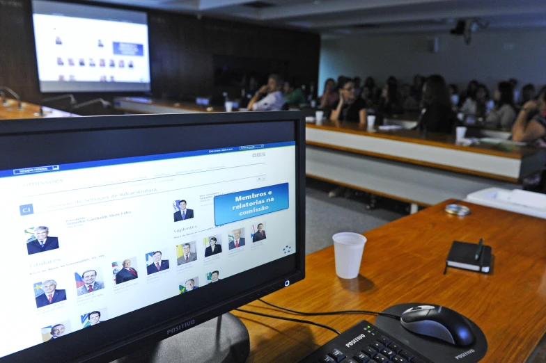 a view of a conference with people in the background