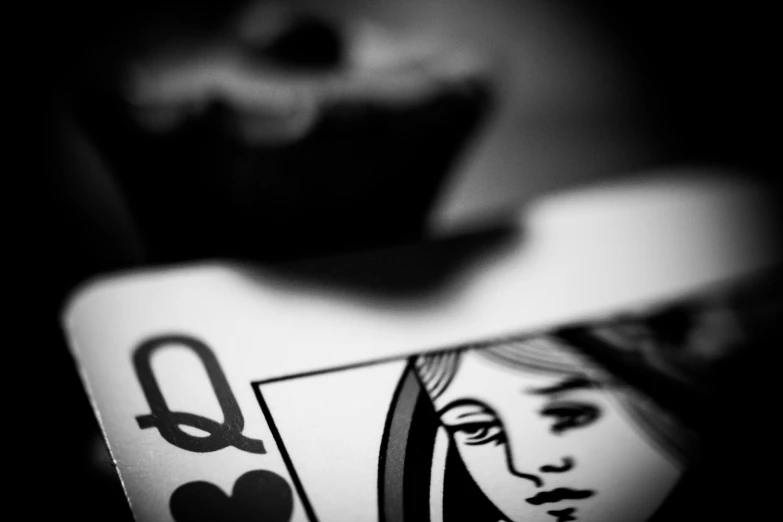 playing cards in black and white with a cupcake