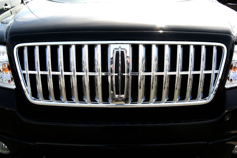 a car grill is shown with its lights on