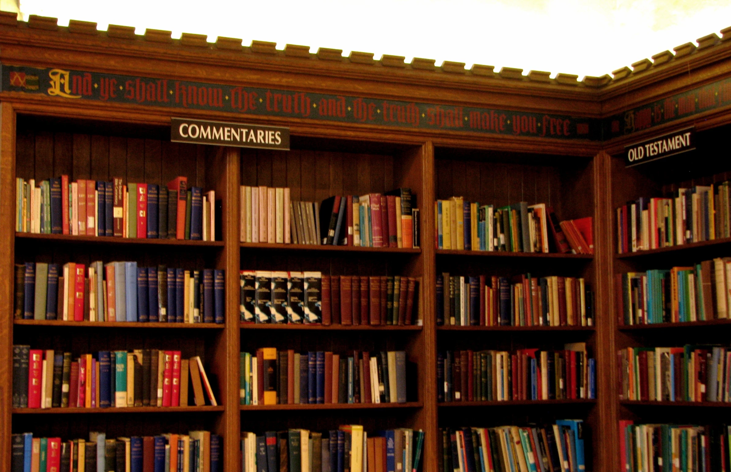 there is a bookshelf with many books on it