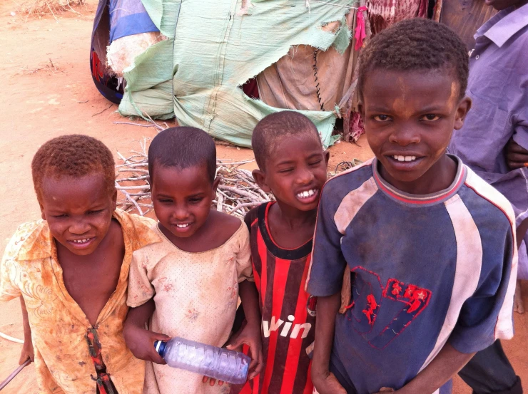 a group of boys posing for a picture