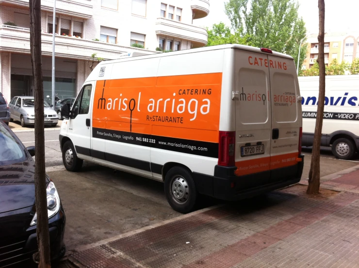 a transport van parked on the side of the road