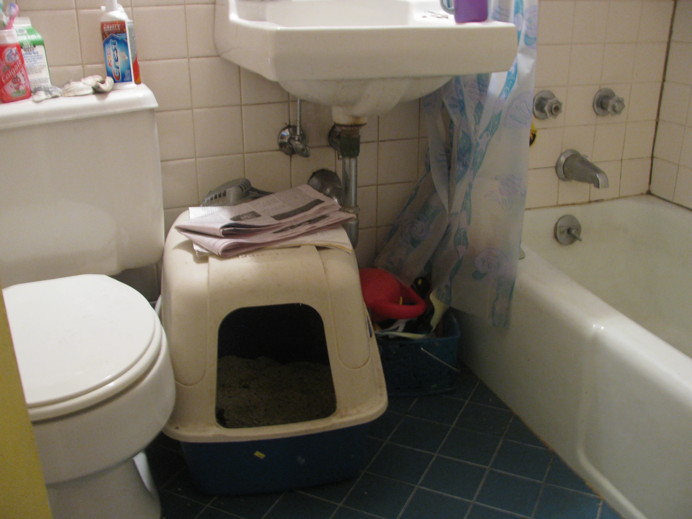 this is an image of a toilet and bathtub