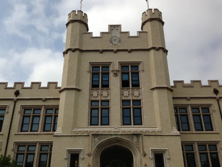 a large building with a tall clock on the top