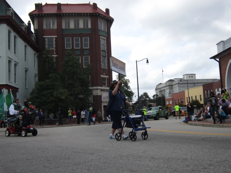 a woman hing two s on their h scooters