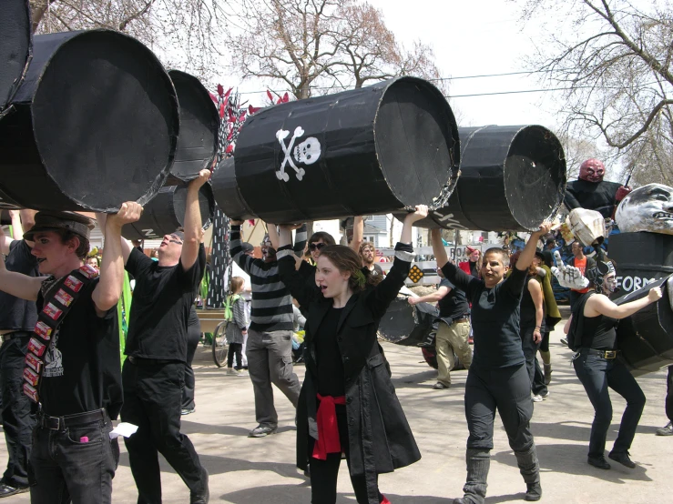 a bunch of people with huge drums are performing