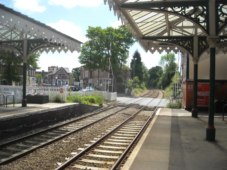 a train station has many tracks to pass by