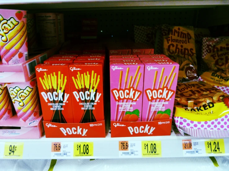 pink soda drink sticks are on display in a store